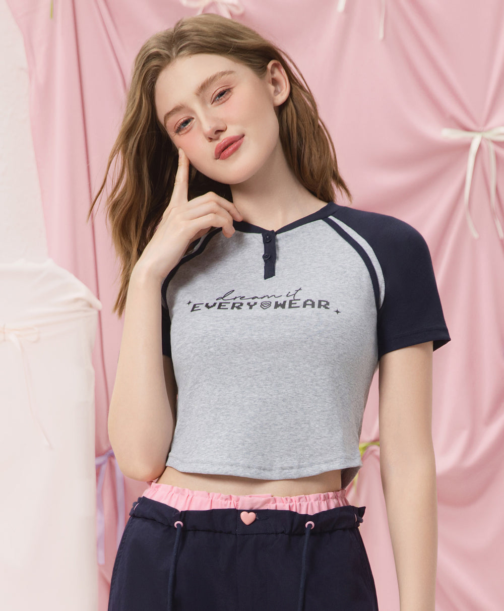 The Playmakers Crop Raglan Baby Tee