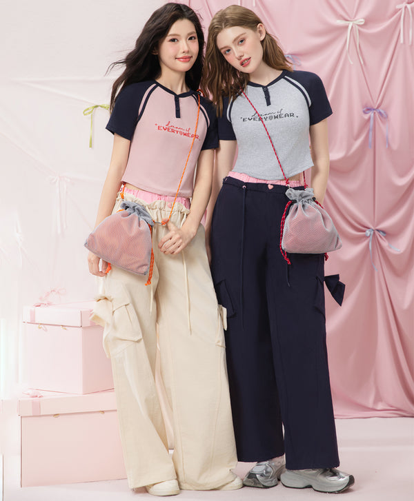 The Playmakers Crop Raglan Baby Tee