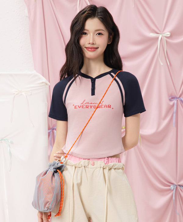 The Playmakers Crop Raglan Baby Tee